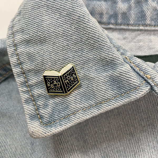 READ MORE ENAMEL PIN
